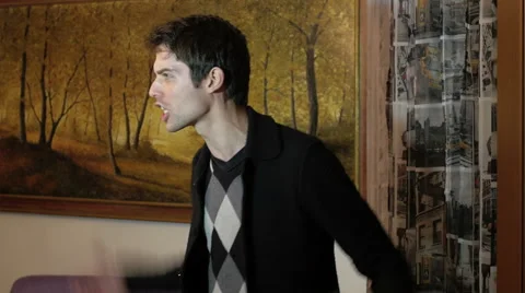 Violent argument between two men in the house 스톡 동영상 65205877