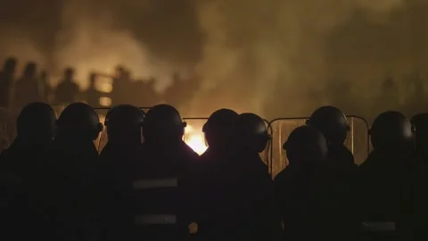 Violent clash between protesters and riot police as city burns 01 Stock Footage 145814791