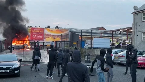 Violent clashes continue on second night of Ballymena disorder Stock Footage 311027493