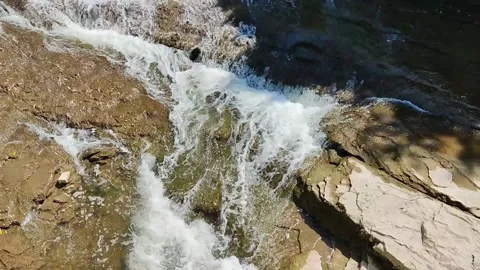 Violent flow of water in a creek 動画素材 234704674