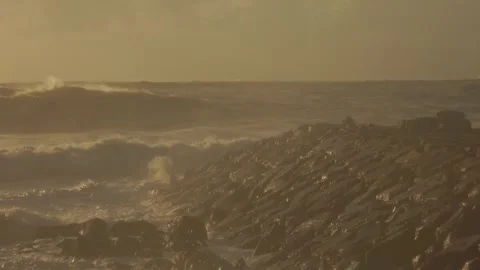 Violent Ocean Waves Crash Onto Ocean Shore After a Storm at Sunset 库存影片 341684017
