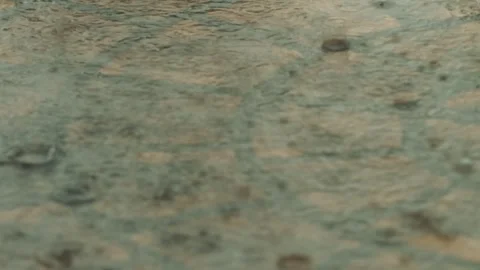 Violent raindrops striking the floor continuously 動画素材 321540138