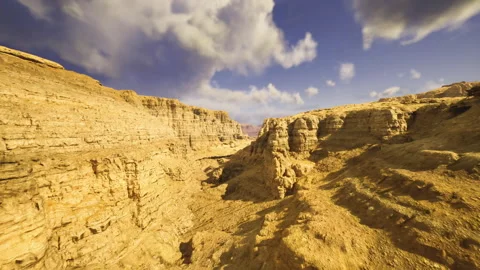 Violent storm clouds swirl above jagged canyon walls dramatically Stock Footage 335101715