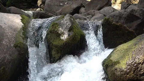 Violently flowing waterfall Stock Footage 105433645