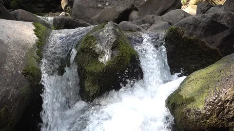 Violently flowing waterfall Stock Footage 105433731
