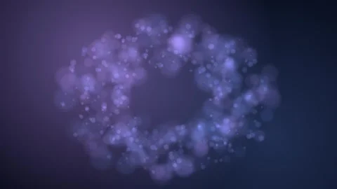 Violet and blue bokeh lights rotate slowly in a circular formation Stock Footage 345185697