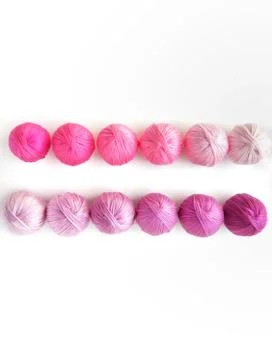 Violet and pink balls of yarn isolated on white background. 库存照片