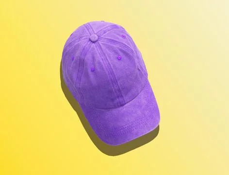 Violet baseball cap top view, lying on yellow background. Sun hat, headwear Stock Photos