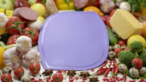 Violet board surrounded by ingredients for yummy sandwich Stock Footage 229844946