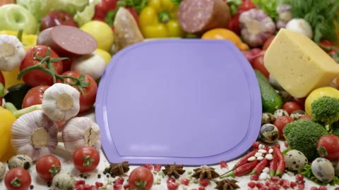 Violet chopping board surrounded by ingredients for sandwich Stock Footage 232203181