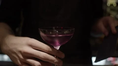 Violet cocktail to camera Video stock 139782463