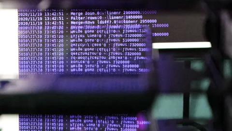 Violet computer software code moving on a black monitor reflect on glass. Abs 스톡 동영상 143878575