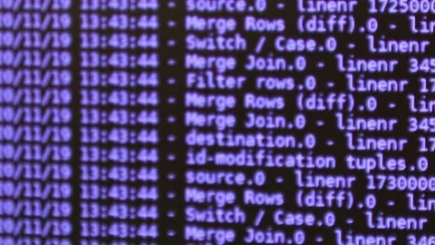 Violet computer software code moving on a black monitor reflect on glass defo Stock Footage 144046631