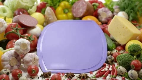 Violet cutting board lying among ingredients for sandwich Stock Footage 231219441
