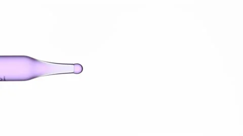 Violet drops are dripping from graduated lab dropper Stock Footage 171890808