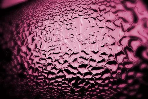 Violet drops of water - light from backside. macro Stock Photos