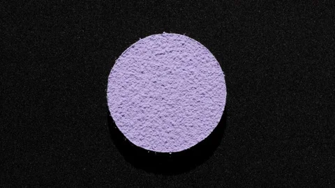 Violet Fine Powder on Solid Black Stock Footage 325353397