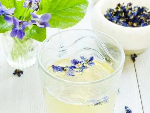 Violet flowers tea Stock Photos