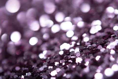 Violet glitter texture. Festive sparkling sequins background closeup. Stock Photos