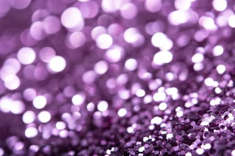 Violet glitter texture. Festive sparkling sequins background closeup. Фото