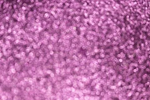 Violet glittering defocused background. Stock Photos