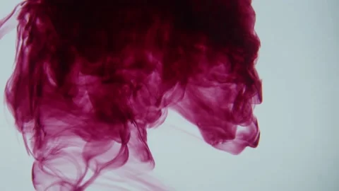 Violet ink in a background slow motion Stock Footage 238922843