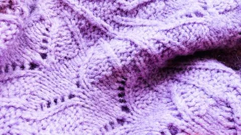Violet knitted surface close up, concept color of the year 2022. Stock Photos