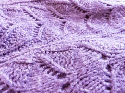 Violet knitted surface close up, concept color of the year 2022. Stock Photos