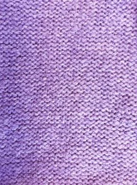Violet knitted surface close up, concept color of the year 2022. Stock Photos