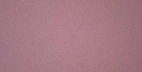 Violet monochrome background with rough surface close-up. Stock Photos