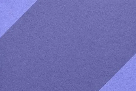 Violet paper texture background with light blue diagonal edges and copy spa.. Stock Photos