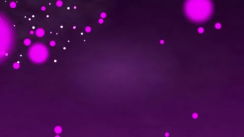 Violet particles float freely on a dark background Stock Footage 246538777