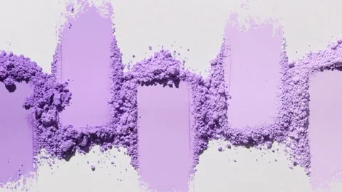Violet powder smears on light grey backdrop Stock Footage 335887370