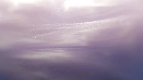 Violet shiny silver particles are abstractedly scattered in different directions Stock Footage 155616307