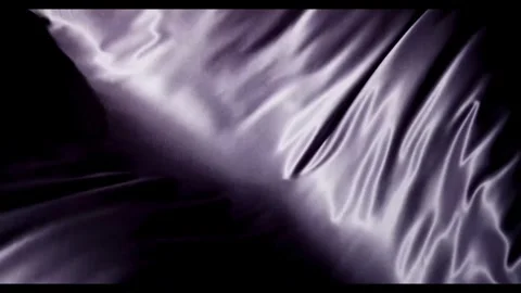 Violet silk material waving with highlights and deep shadows Stock Footage 329751015