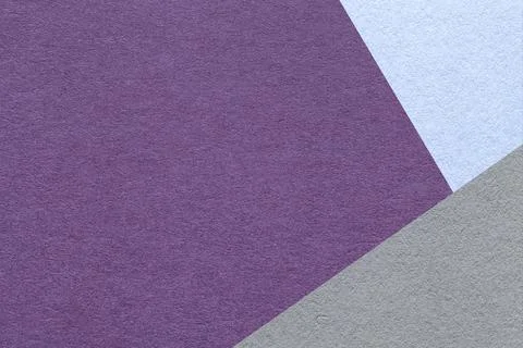 Violet textured paper background with light blue gray triangular corners an.. Ilustración de archivo