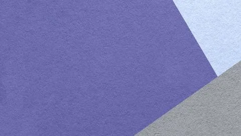 Violet textured paper background with light blue gray triangular corners an.. 스톡 사진