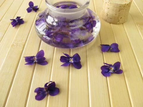 Violets perfume Stock Photos