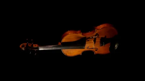 Violin on a black background Stock Footage 61394587