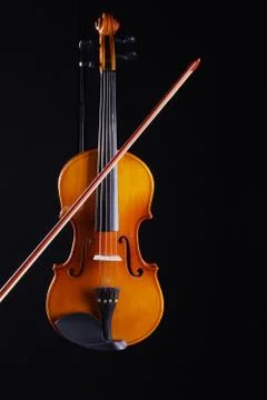 Violin on a black background Stock Photos