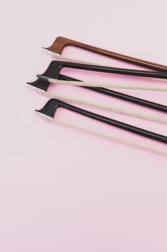 Violin bows tip view - string instruments Stock Photos