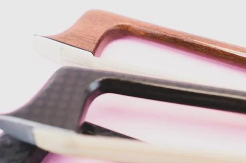 Violin bows tip view - string instruments Stock Photos