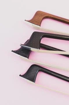 Violin bows tip view - string instruments Stock Photos