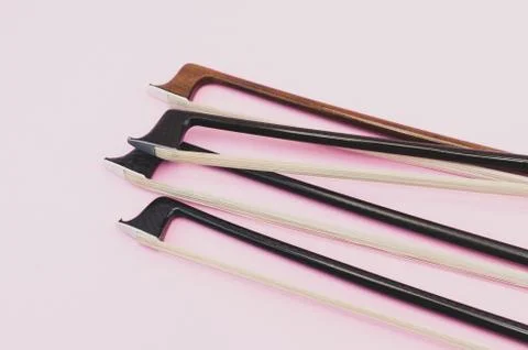 Violin bows tip view - string instruments Stock Photos
