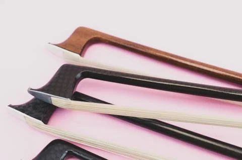 Violin bows tip view - string instruments Stock Photos