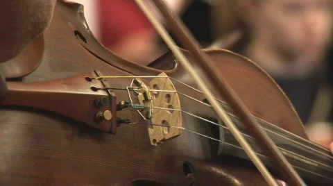 Violin bridge played with bow Stock Footage 558465