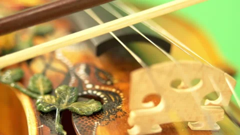 Violin close-up on a green background Stock Footage 201055183