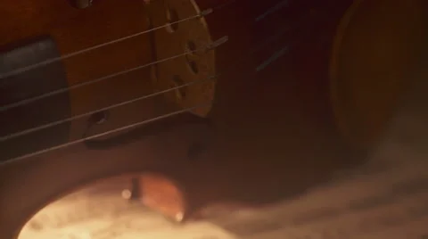 Violin dramatic lighting dolly shot. 4K, UHD, 24fps Stock Footage 65412265