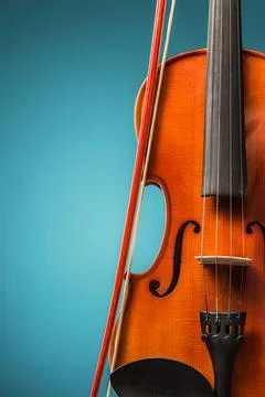 The violin front view on blue Stock Photos