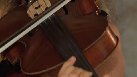 Violin Live Concert with close-up of Womens Hands playing the Violin Stock Footage